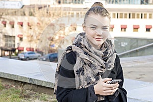 Modern Lifestyle Concepts: Trendy Teenager Girl Using Cellphone