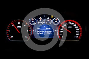 Modern light car mileage on black background Avr speed photo