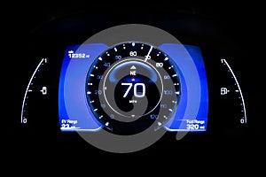 Modern light car mileage on black Battery indicator 70 mph