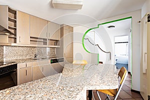 Modern light kitchen with island and stools