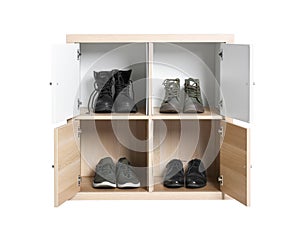 Modern light wooden cabinet with shoes on white. Furniture for wardrobe room