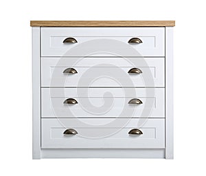 Modern light wooden chest of drawers on white. Furniture for wardrobe room