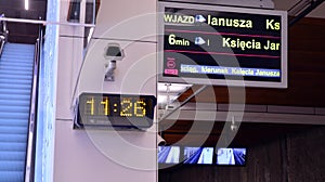 A modern live departure train board above a Warsaw metro line 2 platform. Departure sign in Warszawa Mlynow metro train station.