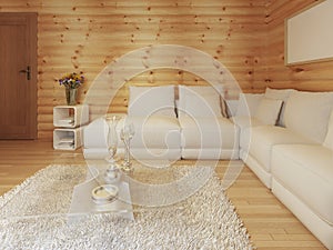 Modern living in a log interior with large white corner sofa.