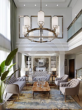 Modern living room in classic style with seating area made of soft quilted furniture and a large chandelier and a white fireplace