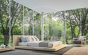 Modern living room with garden view 3d rendering Image photo
