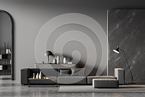 Modern living room interior with arch, marble decoration and dark grey on wall. Black sofa with cushions, coffee table, chest of