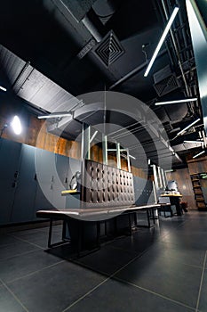 Modern locker room gym interior. Dark lockers in a changing room