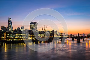 Modern London, morning photo with offices by the river Thames