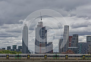 Modern London office buildings and train