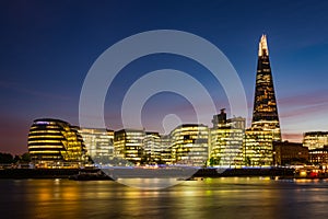 Modern London panorama after sunset - south bank of river Thames