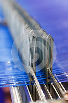 Modern looms with blue thread macro photo