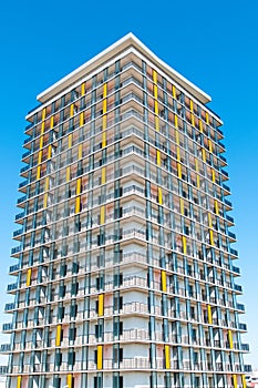 Modern luxury apartment block over blue sky