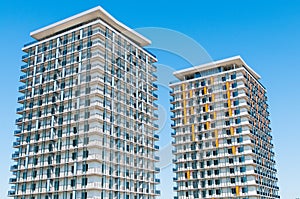 Modern luxury apartment block over blue sky