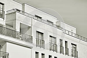 Facade of a modern apartment building. Black and white.