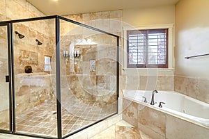 Modern luxury bathroom with glass shower cubicle photo