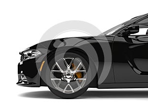 Modern luxury black city sports car - side view cut shot