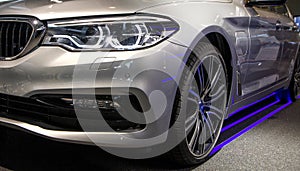 Modern luxury car, headlights closeup. Concept of expensive, sports auto. photo