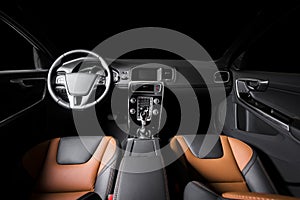 Modern luxury prestige car interior, dashboard, steering whee