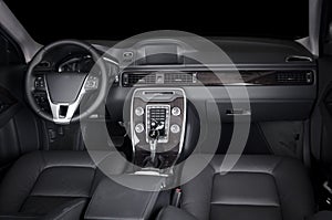 Modern luxury prestige car interior, dashboard, steering wheel.