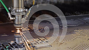 Modern machine laser metal sheet cnc cutting steel plate. High precision cutting machine metal plate. Burn laser cutter