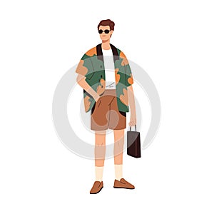Modern man wearing fashion casual clothes. Stylish fashionable summer look. Guy in trendy shorts, shirt, sunglasses