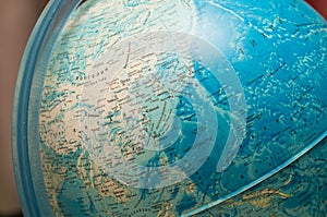 A modern map of the world, a globe.