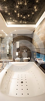 Modern marble bathroom with a large hydromassage