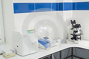 Modern medical laboratory with test analyzers.