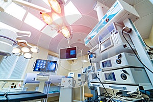 Modern medical light surgery room. Hospital operating technology equipment.