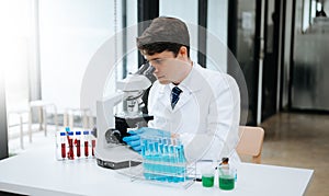 Modern medical research laboratory. female scientist working with micro pipettes analyzing biochemical samples, advanced science