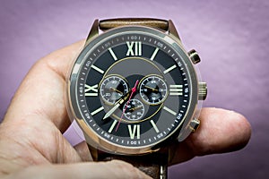 Modern men's watch, brown-gold color