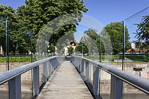 Modern metal glass pedestrian bridge