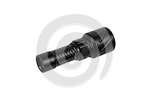 Modern metal LED flashlight in black color. Portable flashlight isolate on a white back