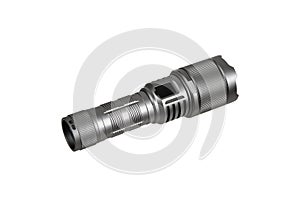 Modern metal LED flashlight in gray color. Portable flashlight isolate on a white back