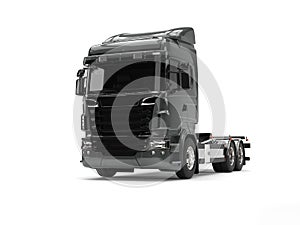 Modern metallic dark gray heavy transport truck without a trailer