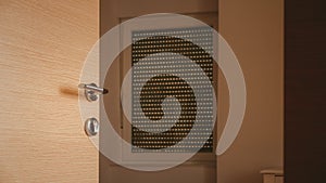 Modern metallic door handle on medium density fiberboard bedroom door