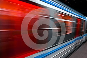 Modern Metro subway Station speed fast Red Blue european public transport for people . Motion speed blur fast moving and arriving