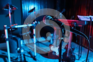 Modern microphone at recording studio, color toned. Music band practice