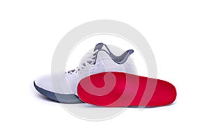 Modern mid-high white basketball shoes sneakers with orthotic inserts