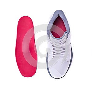 Modern mid-high white basketball shoes sneakers with orthotic inserts