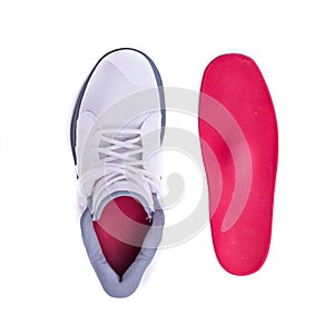 Modern mid-high white basketball shoes sneakers with orthotic inserts