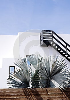 Modern minimal design house. Stylish summer shadows. Travel aesthetic wallpaper. Canary island