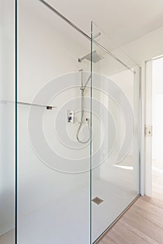 Modern minimal elegant bathroom, wide shower