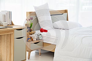The modern or minimal interior bedroom design decorated with comfortable  double bed, white bedding