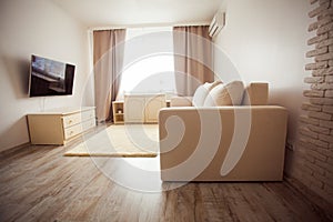 Modern minimalism style sitting room interior in beige tones