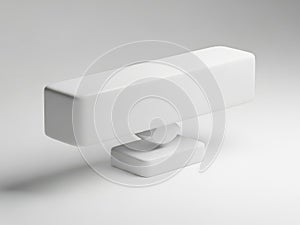 A modern and minimalist white rectangular object with a circular base on a light gray surface