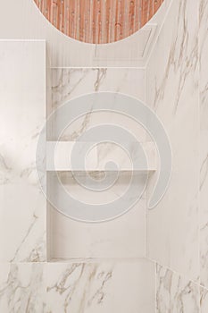 Modern minimalistic bathroom interior design with marble tiles, copper shower with running water.