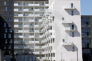 Modern minimalistic Urban Apartment Building with white facade