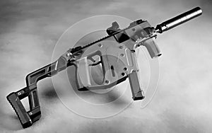 Modern 9mm gun with silencer photo